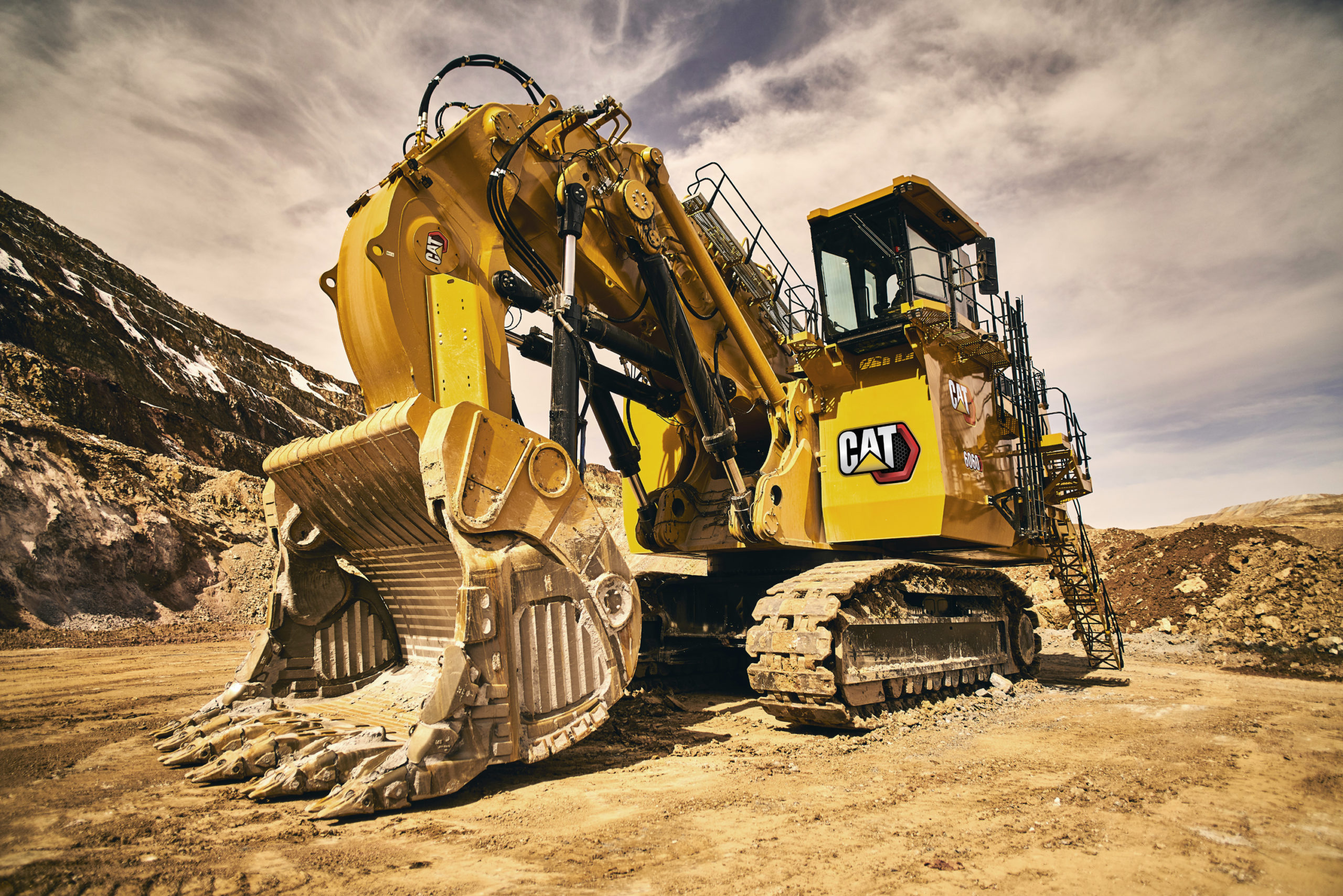 Autonomous Advancements Caterpillar Face Shovel In Action With Trucks Video