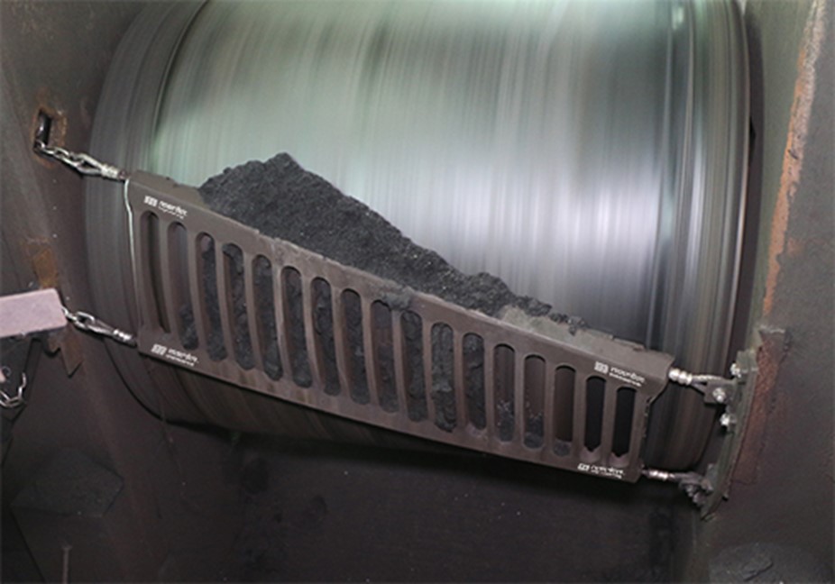 Controlling dust at mine conveyor belt discharge points - International Mining